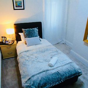 Single Room Shared Shower Toilet